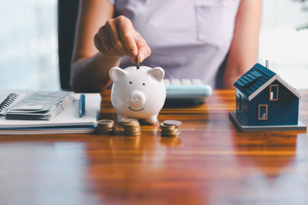 Business home concept involves strategic financial management money coin save bank real estate economic loan investment development growth encourage accountancy buy income stack investment economyの写真素材