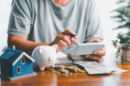 Business home concept involves strategic financial management money coin save bank real estate economic loan investment development growth encourage accountancy buy income stack investment economyの写真素材
