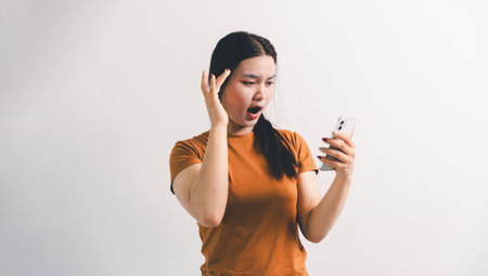 Asian girl expresses dislike, person express negative feeling, concept business complaint from customer ensuring employee satisfaction negative feedback to prevent mental strain customer dislikeの写真素材