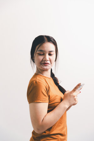 Asian girl expresses dislike, person express negative feeling, concept business complaint from customer ensuring employee satisfaction negative feedback to prevent mental strain customer dislikeの写真素材