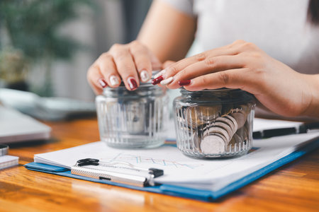 Young Asian woman making stack of coin. invest save finance concept, saving money, investment....