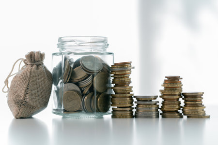 Business save money coin growth concept involves strategic financial management investment loan bank real estate economic development encourage buy income stack investment economy return accountancyの写真素材