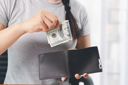 Business, finance and employment, entrepreneur and money concept. Successful young asian office manager, businesswoman showing earned cash, satisfied holding dollars, money dollar billsの写真素材