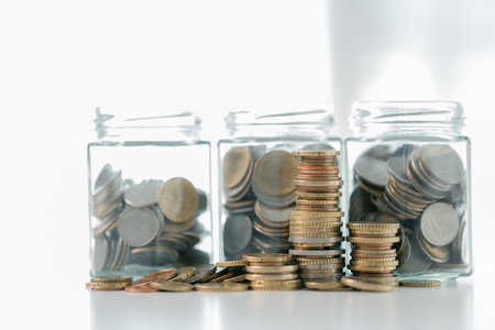 Business save money coin growth concept involves strategic financial management investment loan bank real estate economic development encourage buy income stack investment economy return accountancyの写真素材