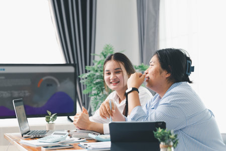 People meeting using laptop computer, calculator, stock market chart paper for analysis plans to improve quality. Team working on project. Analysis business brainstorming corporate smart Concept.の写真素材