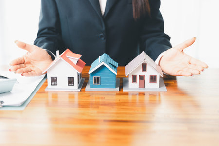 Real estate agents bid home in project to explain in detail to clients. Explain and present information about home and mortgage purchases. real estate trading concept. Real estate trading, buy, sellの写真素材