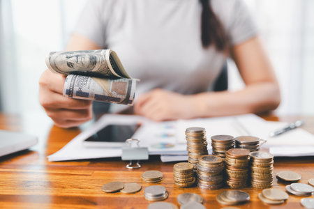 Business, finance and employment, entrepreneur and money concept. Successful young asian office manager, businesswoman showing earned cash, satisfied holding dollars, money dollar billsの写真素材