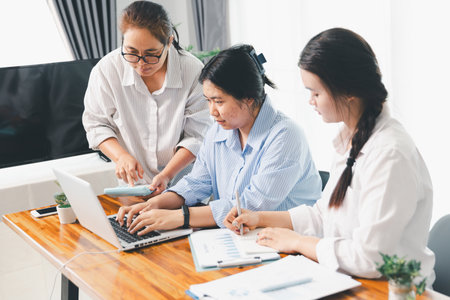 Teamwork meeting, business people in office workplace. Collaboration, technology and worker, employees with touchscreen planning sales, research or financial strategy, staff for conversation, graphの写真素材