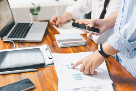 Teamwork meeting, business people in office workplace. Collaboration, technology and worker, employees with touchscreen planning sales, research or financial strategy, staff for conversation, graphの写真素材
