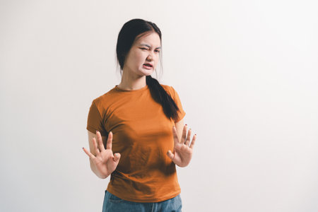 Asian girl expresses dislike, person express negative feeling, concept business complaint from...