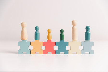 Concept of diversity, inclusion, equality is highlighted in team setup, wooden elements, symbolizing leadership, authority, influence, strong communication skills, inclusive organizational structure.の写真素材