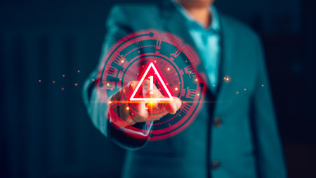 Businessman pressing digital warning alert icon on virtual screen, concept of cybersecurity risk, data protection, internet safety, system failure and technology security alert. system warning alert.の写真素材