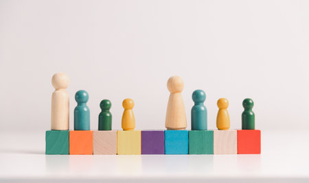 Concept of diversity, inclusion, equality is highlighted in team setup, wooden elements, symbolizing...