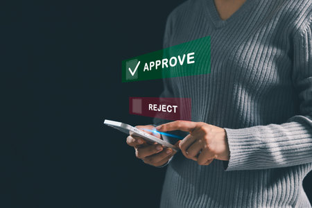 Businesswoman ticking correct mark to approve project, management concept examination, survey, technology ensure business certification standard, successfully passes inspection approved and accepted.の写真素材