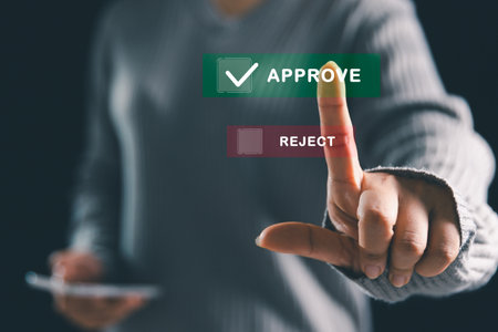 Businesswoman ticking correct mark to approve project, management concept examination, survey, technology ensure business certification standard, successfully passes inspection approved and accepted.の写真素材