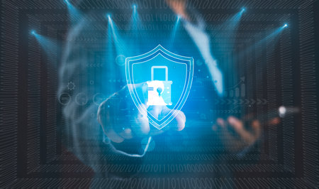 Digital shield with lock icon over binary code background represents cybersecurity, data protection, secure system, information privacy advanced technology solutions modern business online securityの写真素材