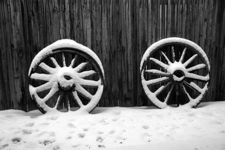 Snow with Wagon Wheelsの写真素材
