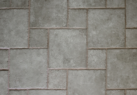 Irregular tiles form an abstract pattern for a wall 