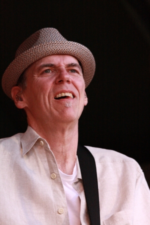 John Hiatt performs his rock and roll magic for an appreciative music festival audience.のeditorial素材