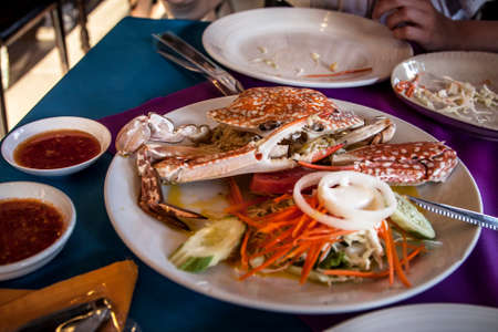 Beautiful sea crab on a plate in Thailandの写真素材