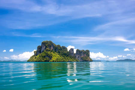Rocky islands of thailand under blue skyの写真素材