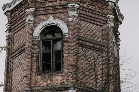 Fragment with a window on an old abandoned tower
