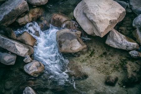 seething stream among the rocksの写真素材