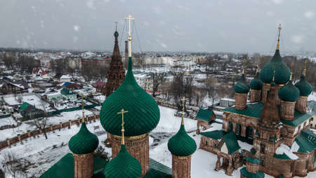 Beautiful old church with towers and domes. winter day. overcast weather. ancient architecture.の写真素材