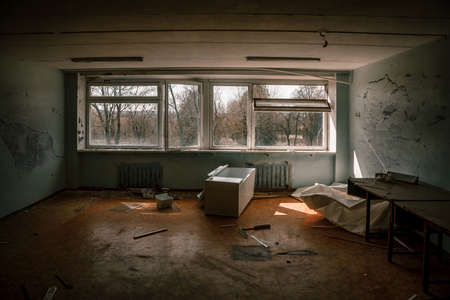 Empty room in an abandoned building. Soviet architecture. light in the window. beautiful shadows....