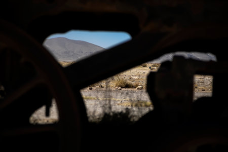 Old car wheel in the desert of the Uyuni, Boliviaの写真素材