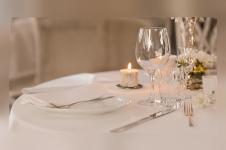 Elegant table setting for wedding or other celebration event in restaurantの素材