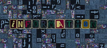 The word Information as letters in letterpress type over mosaic backgroundの写真素材