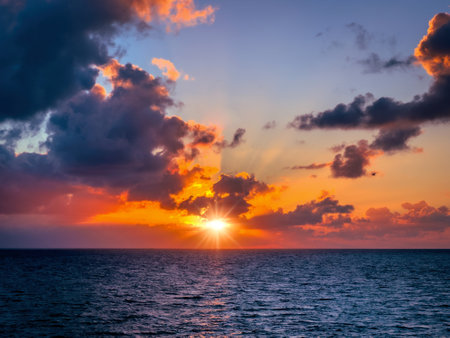 Colourful sunrise over the ocean, Cayo Guillermo, Cubaの写真素材