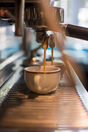 Preparing a cup of coffee in the machine.
