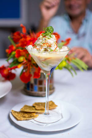 Ceviche. Cup with raw fish and lemon. Peruvian food.の写真素材