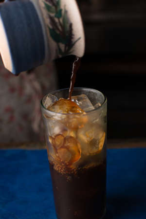 Preparing cold coffee. Ice coffee. Cold drink.