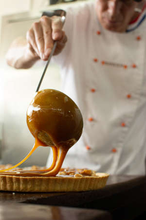 Macadamia cake with toffee. Making a cake. Cake shop. Cake shop. Candyの写真素材