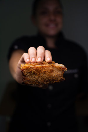 Pork belly with fried egg. Fried pork. Ecuadorian cuisine. Grill.の写真素材