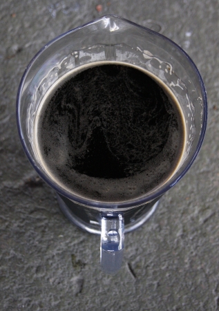 A pitcher of dark beer A pitcher of dark beer