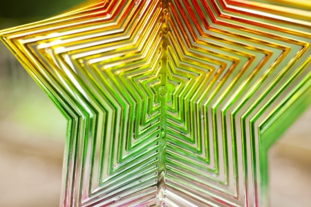 A star shaped rainbow colored hanging wind ornamentの写真素材