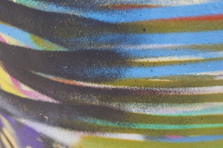 Colorful abstract detail of a spray painted surfaceの写真素材