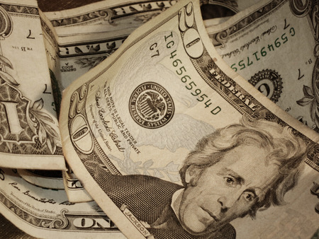 A filtered view of a pile of United States dollar bills 