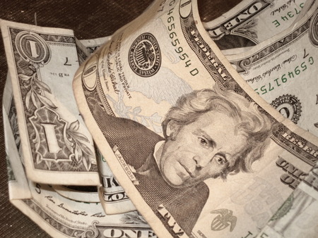 A filtered view of a pile of United States dollar bills 