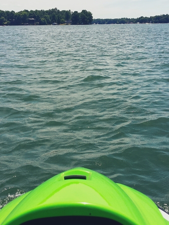 A waverunner jet ski on a lake.の写真素材