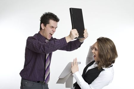 Hitting with a laptopの写真素材