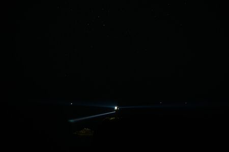 lighthouse aszuri with starsの写真素材