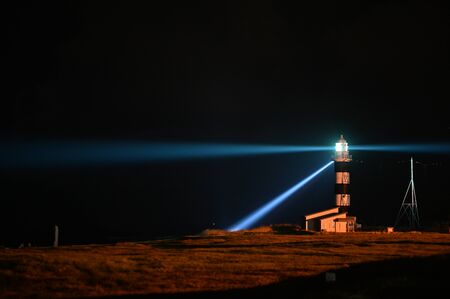 lighthouse at nightの写真素材