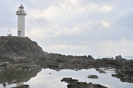 Lighthouse on the coast of Jeju Island, South Korea.の写真素材