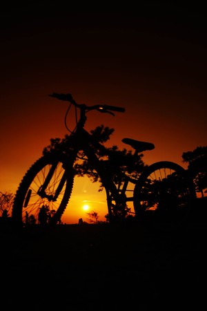 bicycle and sunsetの写真素材