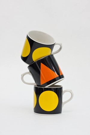 coffee cup tower on white background.の写真素材